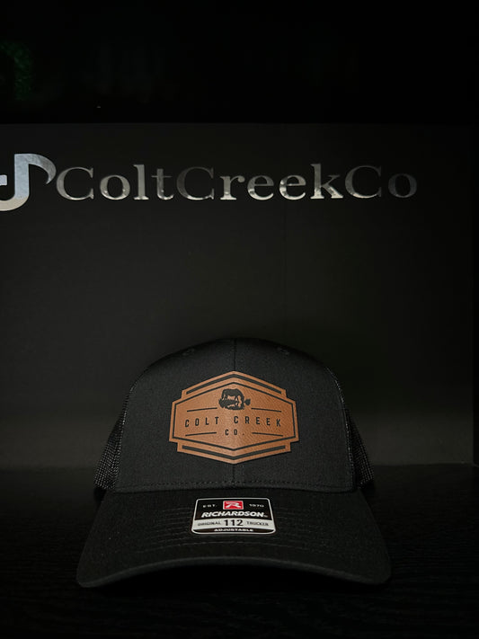 OG Colt Creek Co. Black Leather Patch Trucker